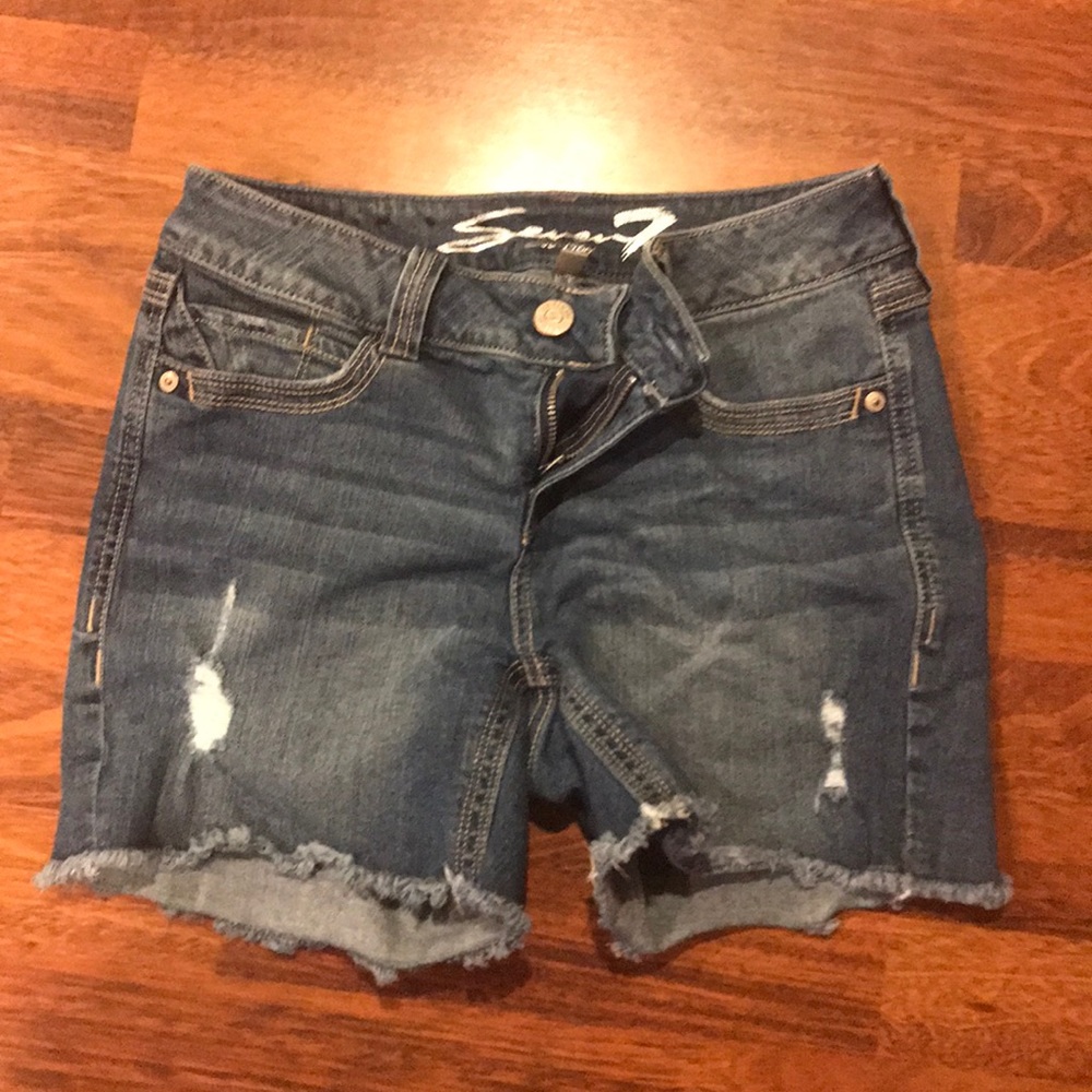 Slightly distressed jean shorts